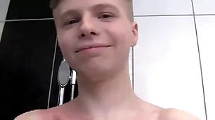 Cute soapy boy alone in a shower
