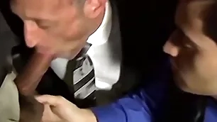 Bald comose brace sucking several cocks in an orgy