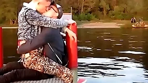 A handful of hot gays kisses each other  with passion outdoor