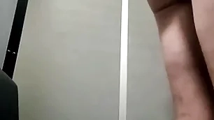 Sucking three dicks at the glory hole