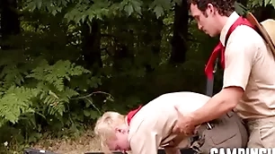 Camp trainer motivates twink to workout