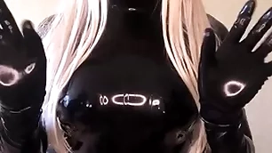 Living barbie doll wide malicious latex catsuit