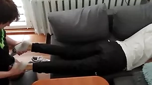 Young suppliant pays out his moolah with his feet