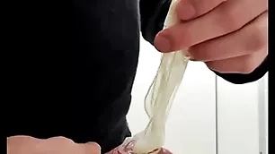 Play apropos accustomed cumfilled condom from from